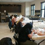 A group of phagans student working on their lash extension certification