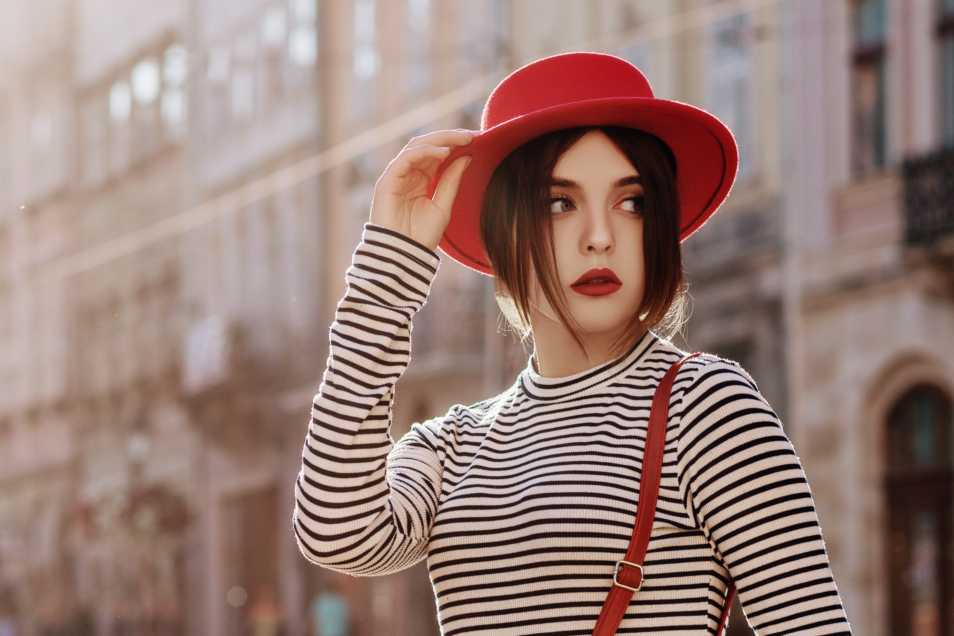 woman wearing a shirt with thicker stripes