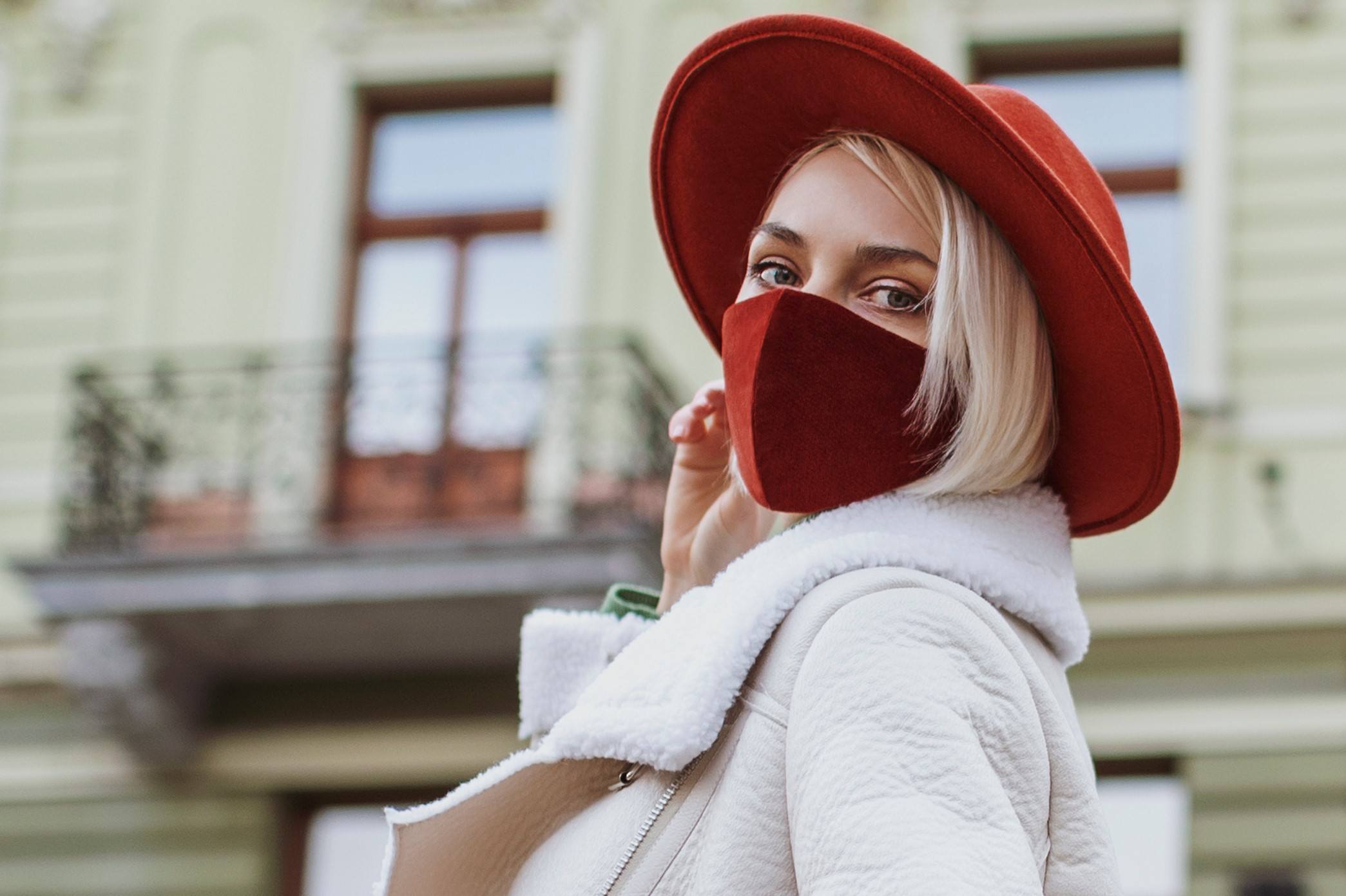 woman with red hat and red mask