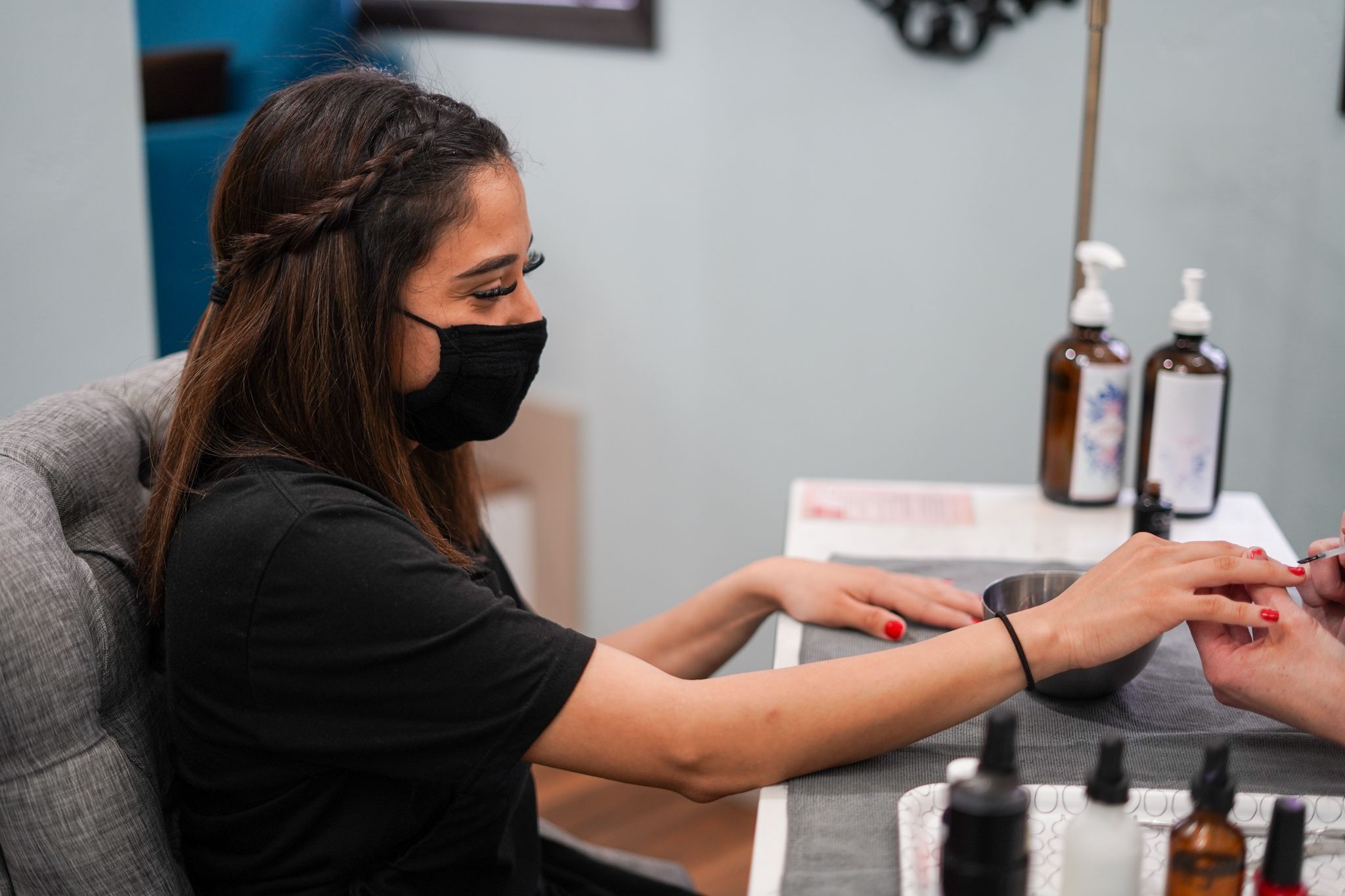 client getting her nails done